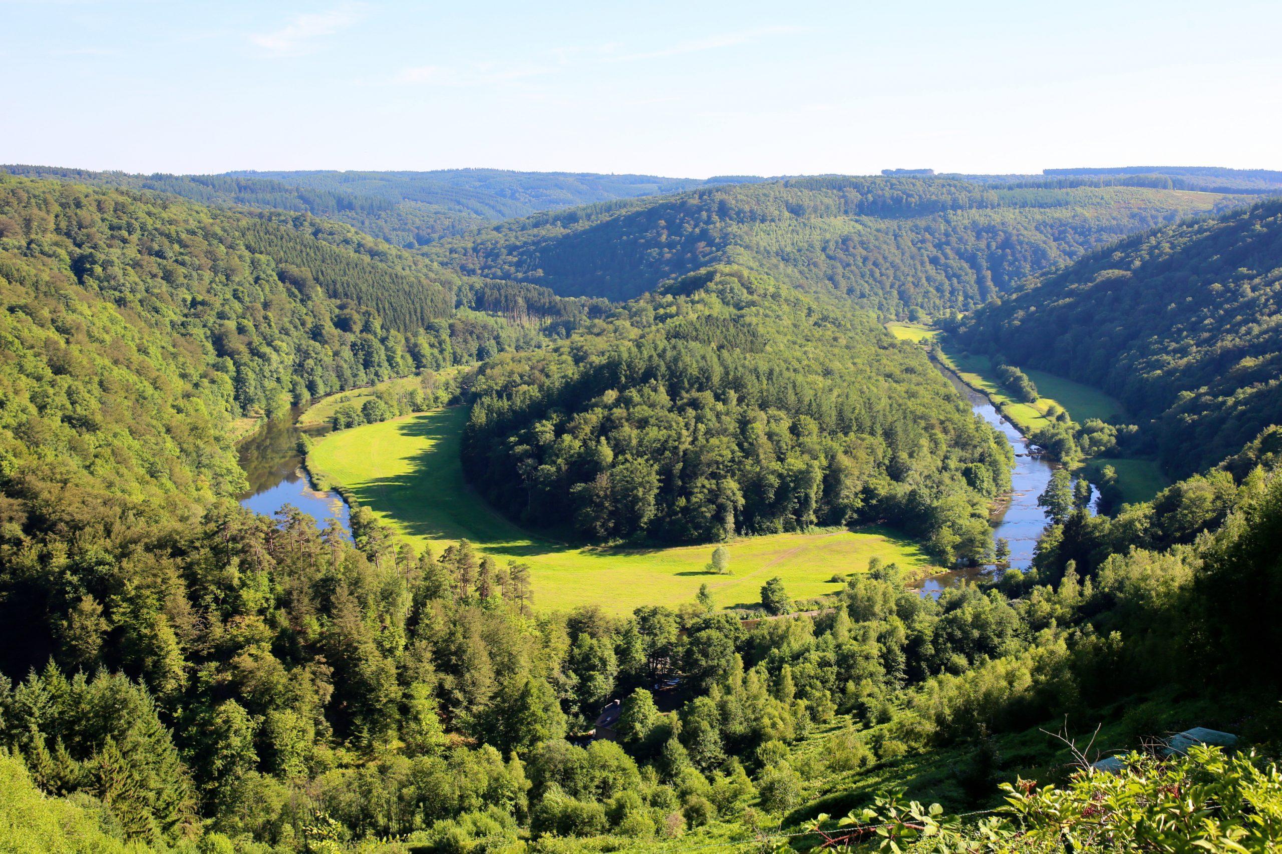 Elevated view from famous panoramic viewpoint of beautiful Tombeau du Géant (The Giant's tomb) lying inside the bend of the river Semois. It is located nearby the city of Bouillon, Wallonia, Ardennes, Belgium.